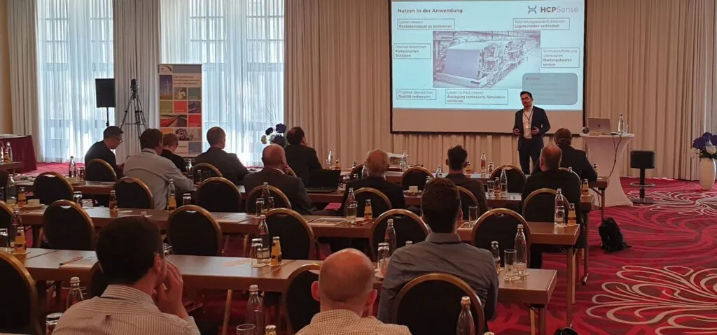 EIn Photo von HCP Sense Mitgründer, der HCP Sense auf dem PTS Netzwerktag in Dresden vorstellt